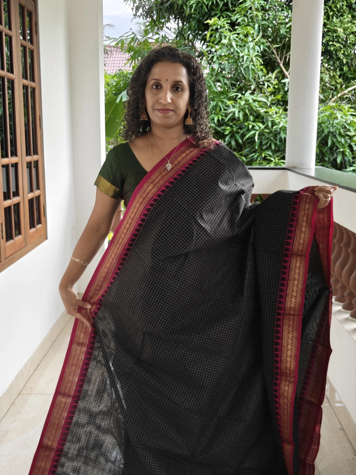 Black Kanchi Cotton Saree with Magenta and Gold Zari Border